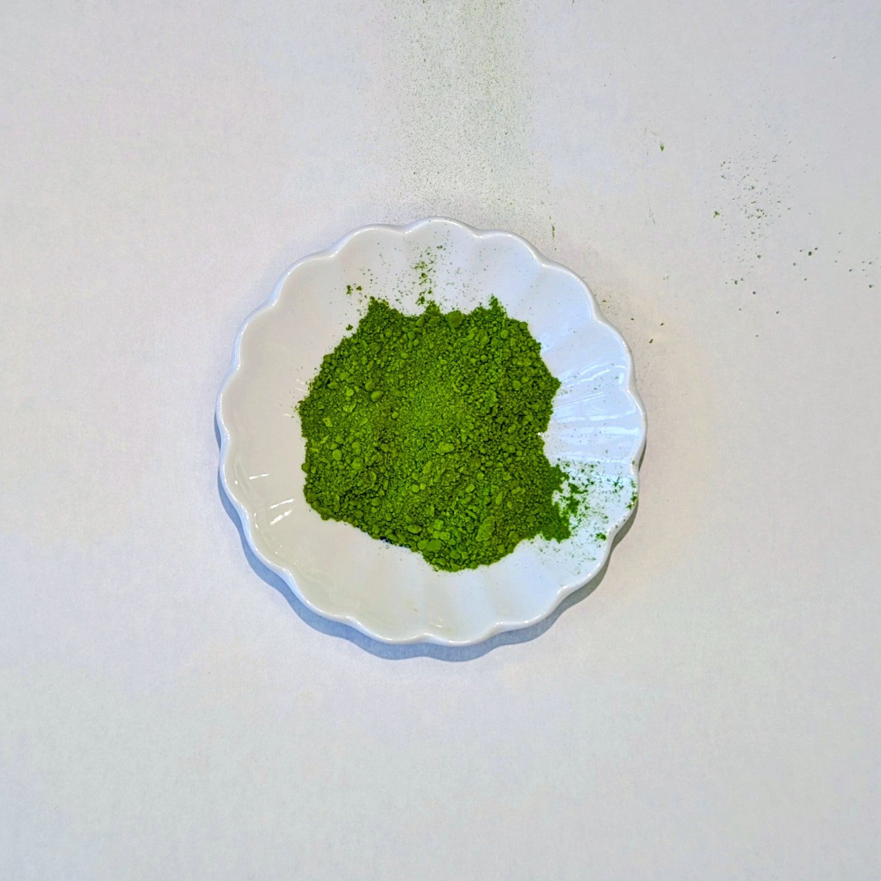Matcha powder on a white plate